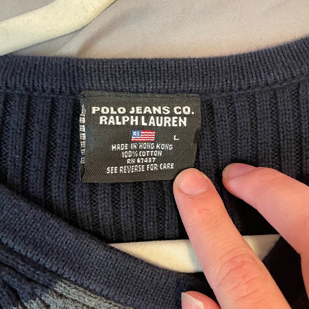 Ralph Lauren stripped sweater in the color dark blue and grey
